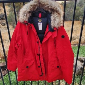 Red polo trench coat, with hood and fir.